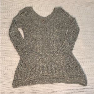 Women’s “Free People” pull over sweater.